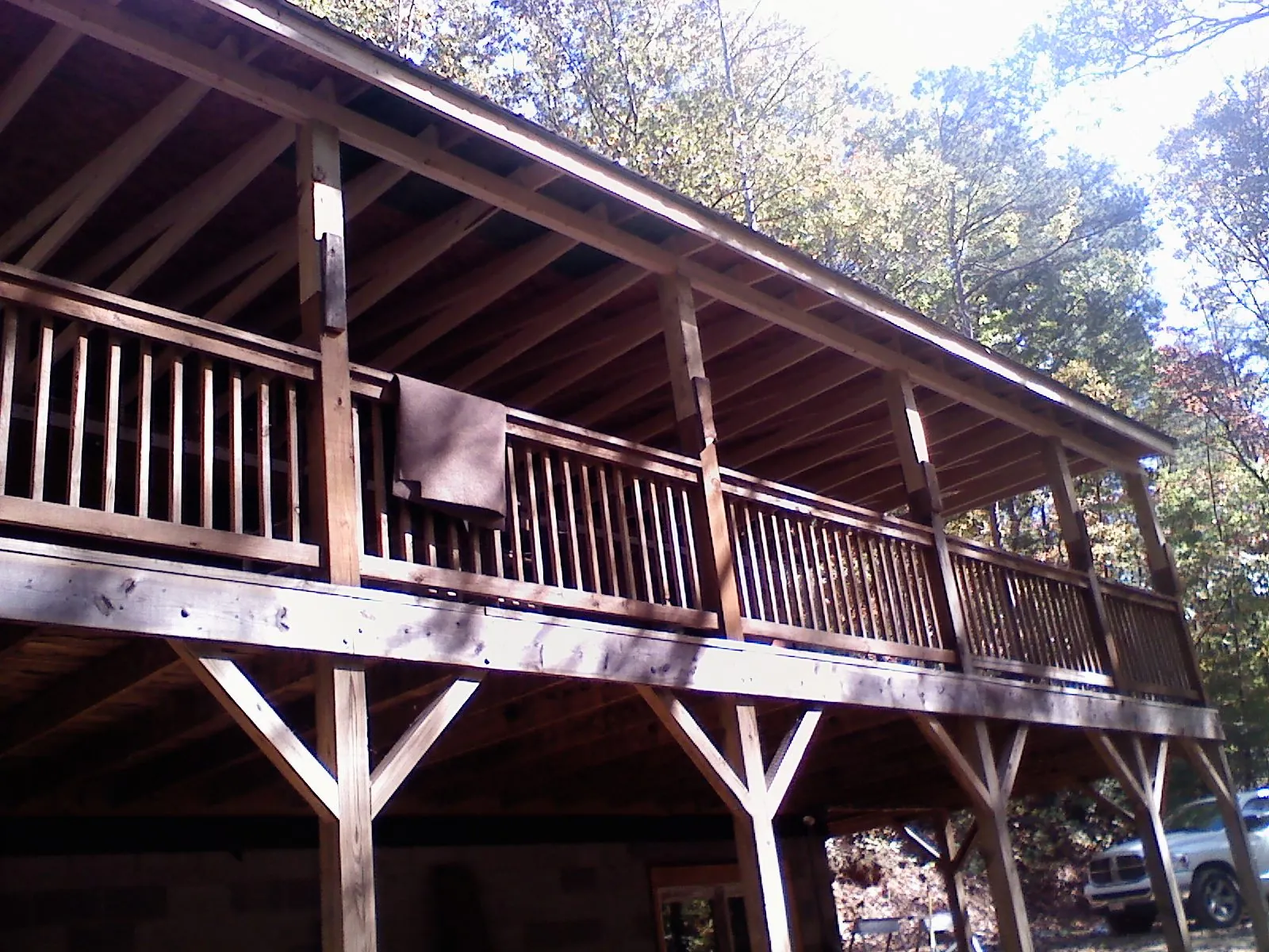 Timber framing under a new elevated porch and deck — Roof Leak Repair in Lake Worth by Roofing Brothers